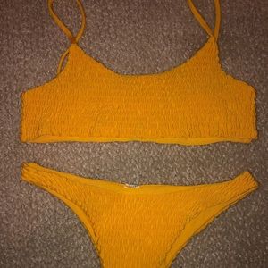 Super cute yellow swim suit never worn